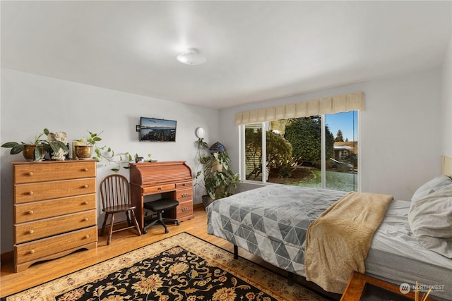 bedroom featuring hardwood / wood-style flooring