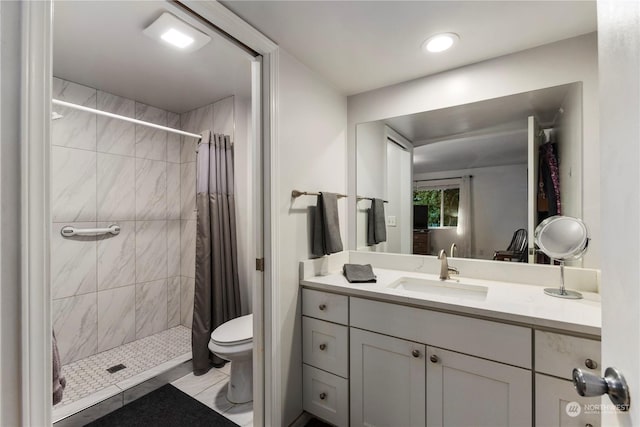 bathroom with vanity, toilet, and a shower with shower curtain