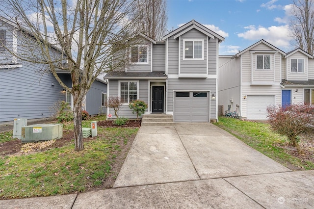 front of property with a garage