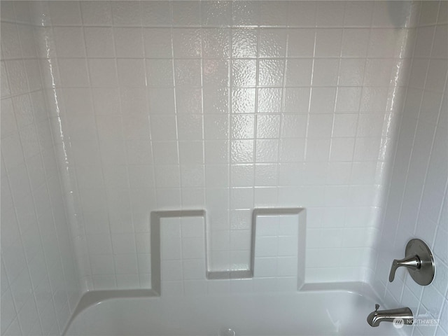 room details with shower / bathing tub combination