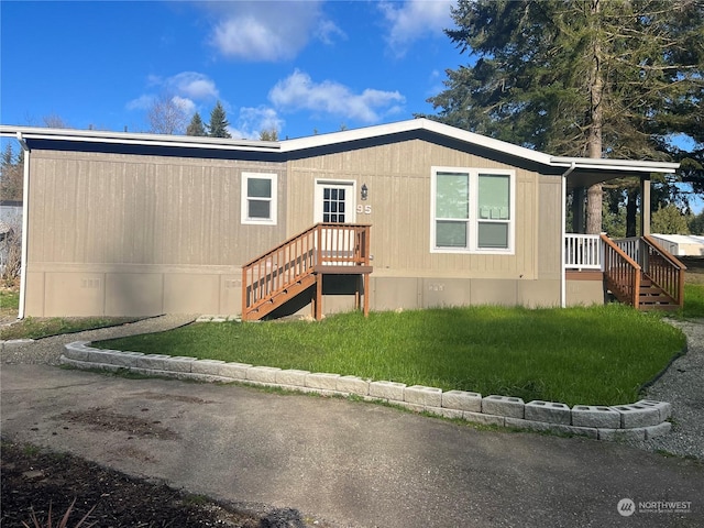 exterior space featuring a front lawn