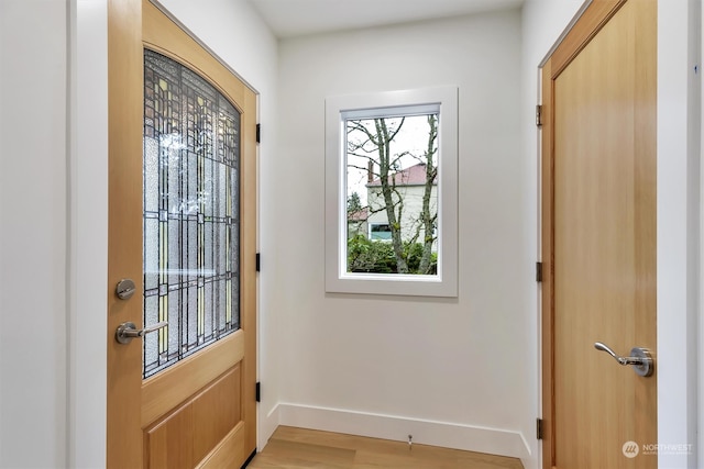 doorway featuring light wood-type flooring