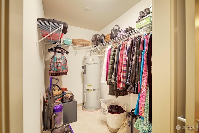 walk in closet featuring secured water heater