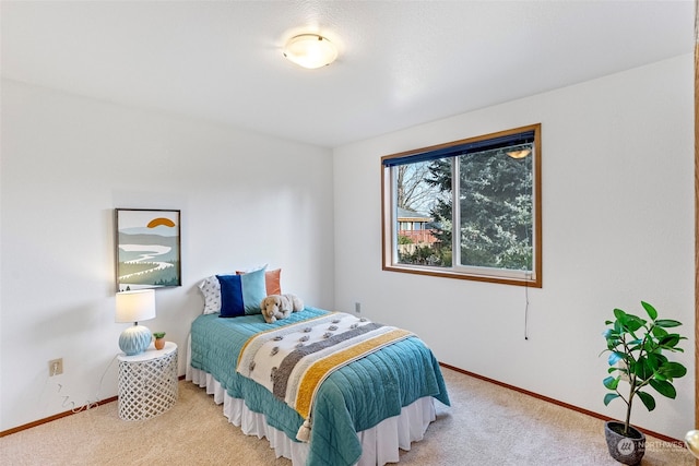 bedroom with light colored carpet