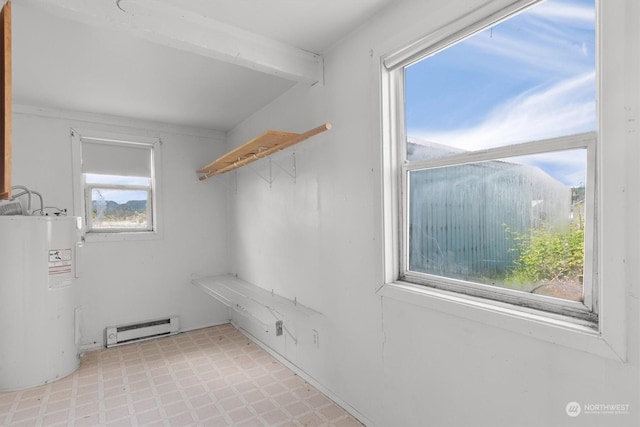 interior space featuring electric water heater, a baseboard heating unit, and a wealth of natural light