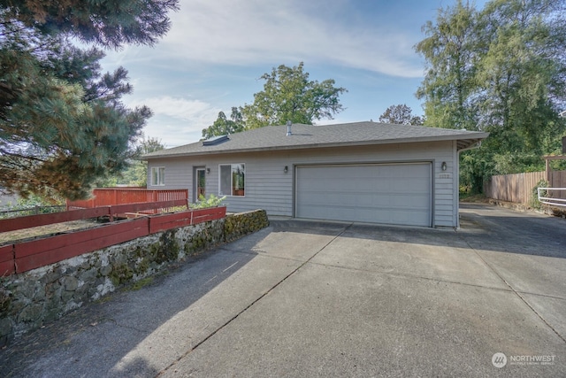 view of front of home featuring a garage