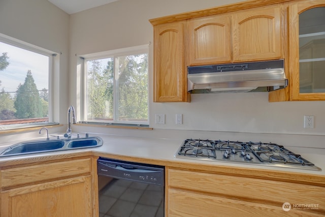 kitchen featuring light brown cabinets, black dishwasher, sink, and stainless steel gas cooktop