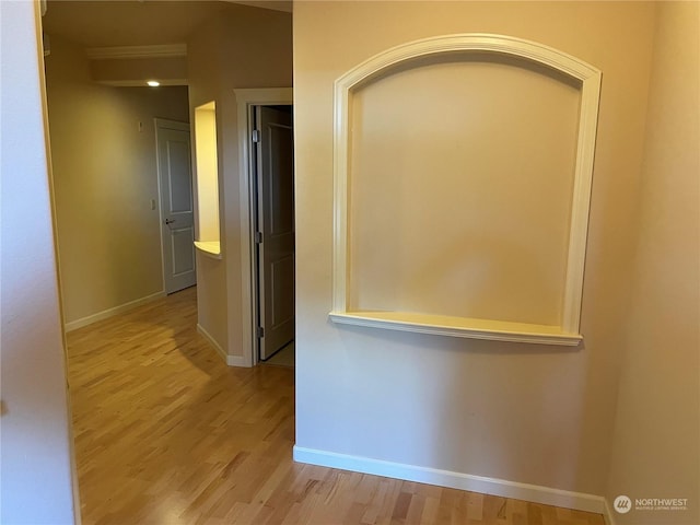 hall with light hardwood / wood-style floors