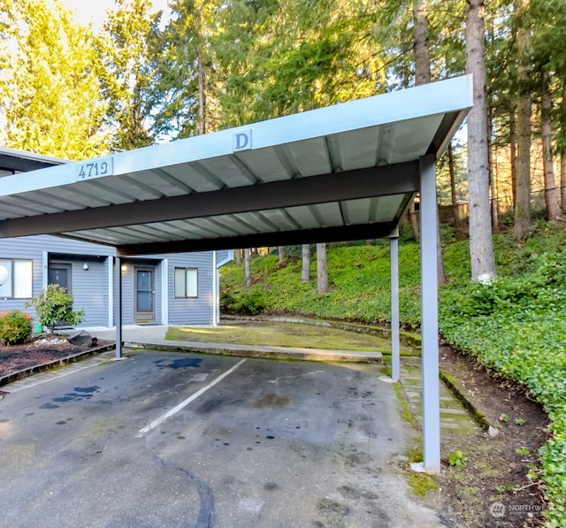 view of parking featuring a carport