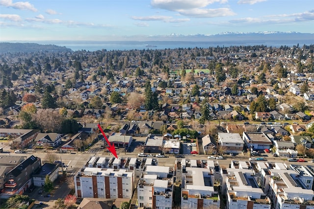 birds eye view of property featuring a mountain view