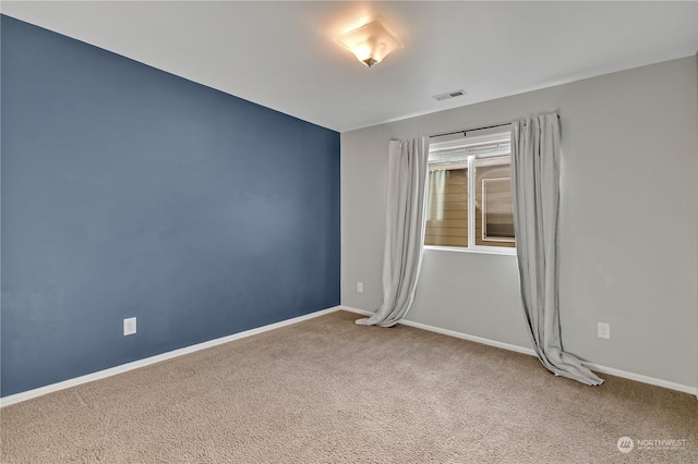 view of carpeted spare room