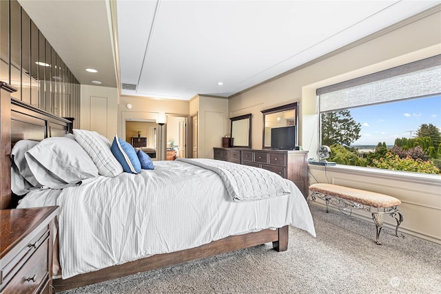 carpeted bedroom featuring ornamental molding