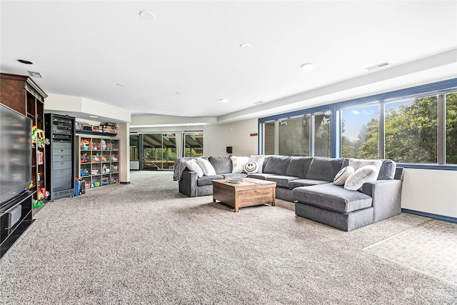 living room featuring light colored carpet