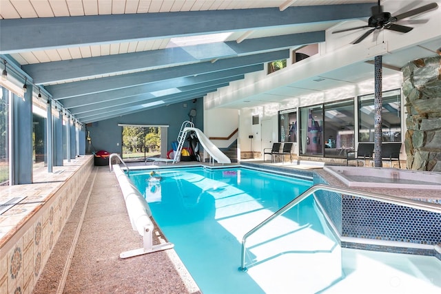 view of pool featuring a water slide