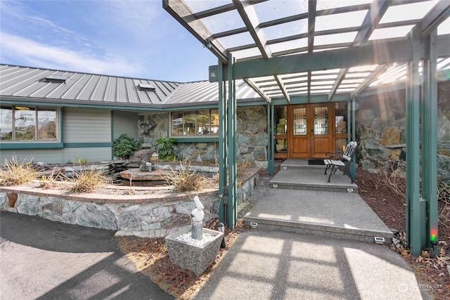 doorway to property featuring french doors