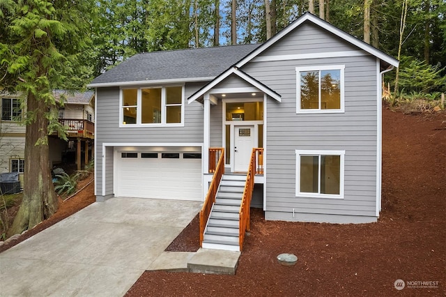 raised ranch featuring a garage