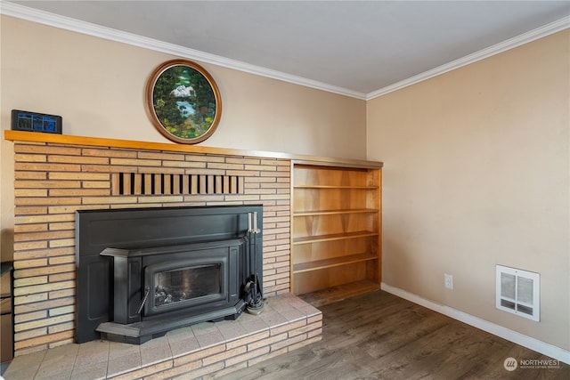 details with wood-type flooring, a wood stove, and ornamental molding