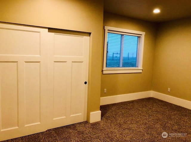 unfurnished bedroom featuring carpet floors