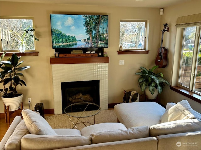 living room featuring a fireplace