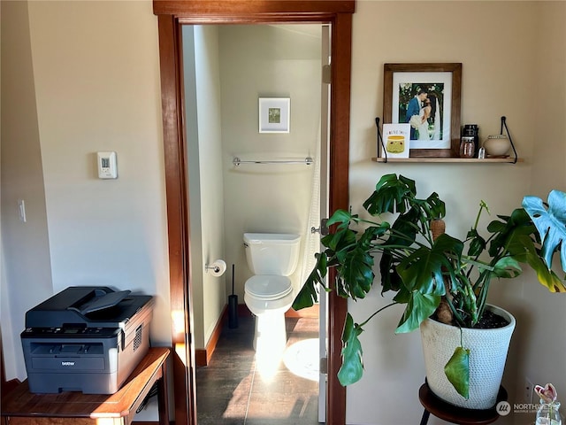 bathroom with hardwood / wood-style floors