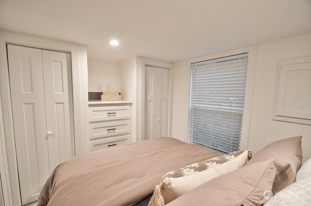 bedroom featuring two closets