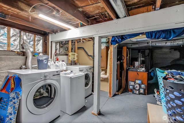 basement with washer and clothes dryer