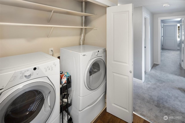 washroom with dark carpet and independent washer and dryer