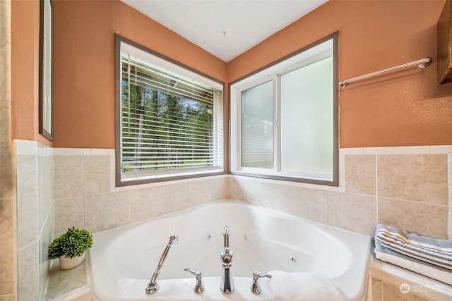 bathroom featuring tiled bath