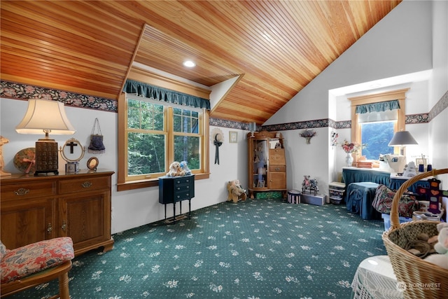 sitting room featuring lofted ceiling, wooden ceiling, and dark colored carpet