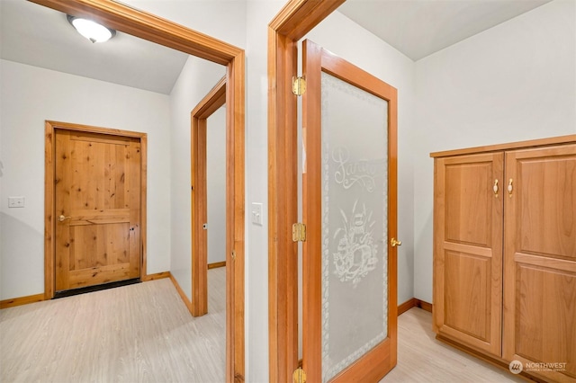 hall featuring light wood-type flooring