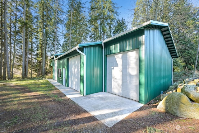 view of outdoor structure with a garage