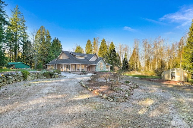 view of front of home with an outdoor structure