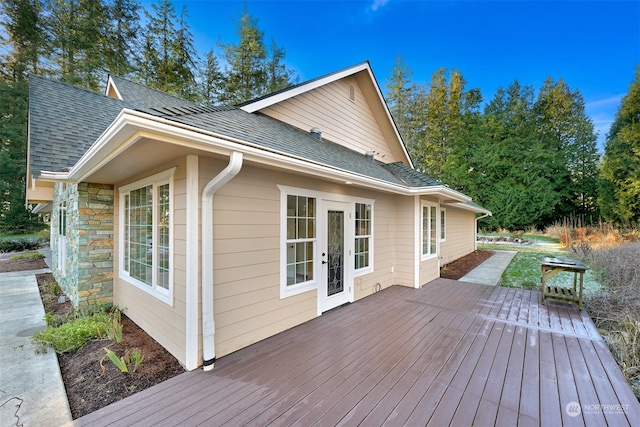 wooden deck featuring french doors