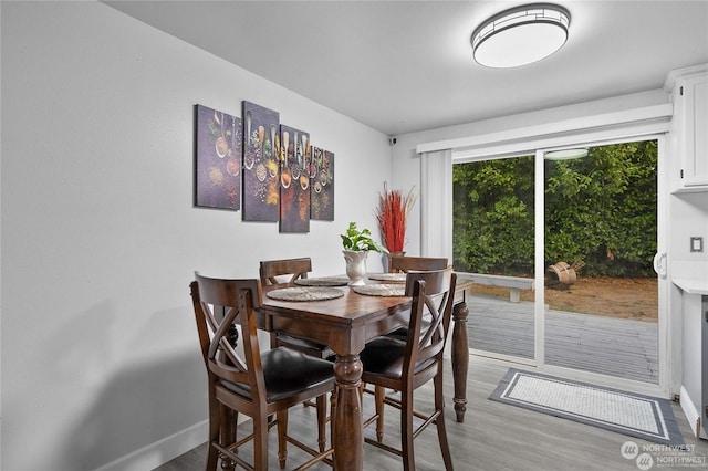 dining room featuring hardwood / wood-style flooring