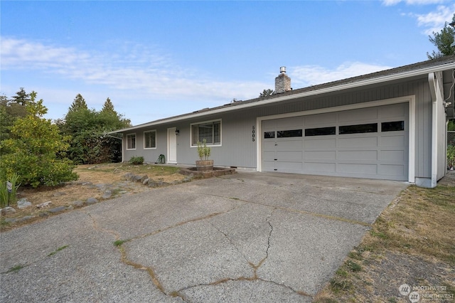 ranch-style home with a garage