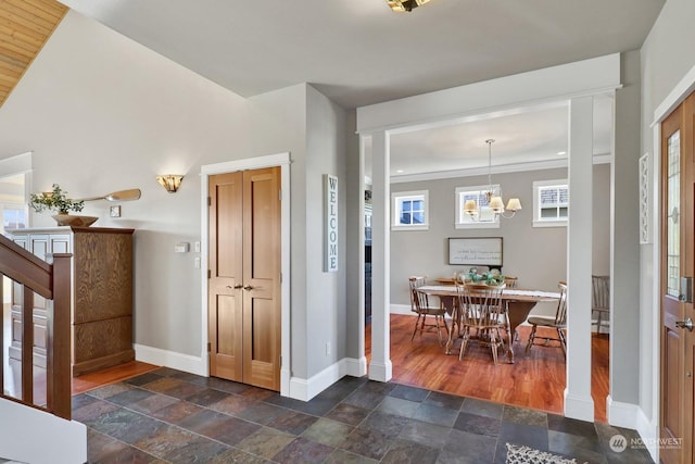 foyer with a notable chandelier