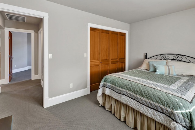 bedroom featuring carpet and a closet