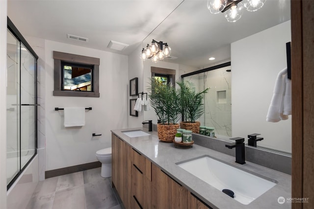 bathroom with vanity, toilet, and hardwood / wood-style floors