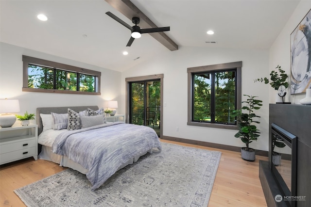 bedroom with multiple windows, access to exterior, light hardwood / wood-style flooring, and ceiling fan