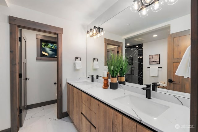 bathroom featuring vanity and a shower with shower door