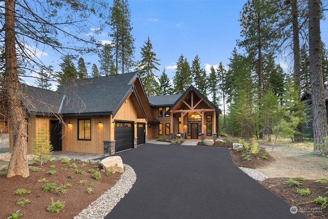 view of front of property with a garage