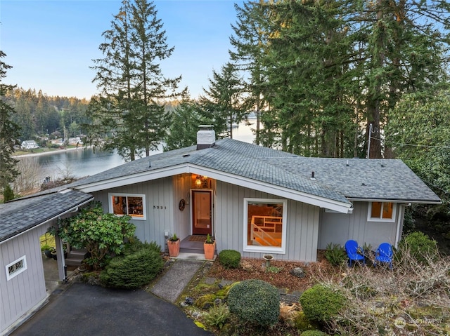 single story home with a water view