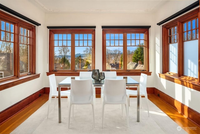 sunroom / solarium featuring plenty of natural light