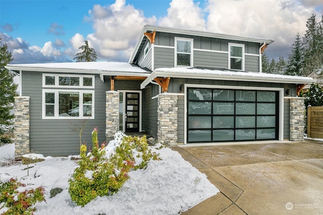 view of front of property featuring a garage