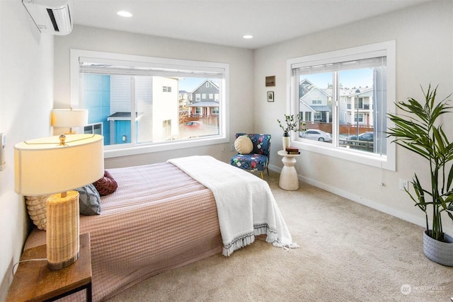 bedroom with carpet and a wall mounted AC