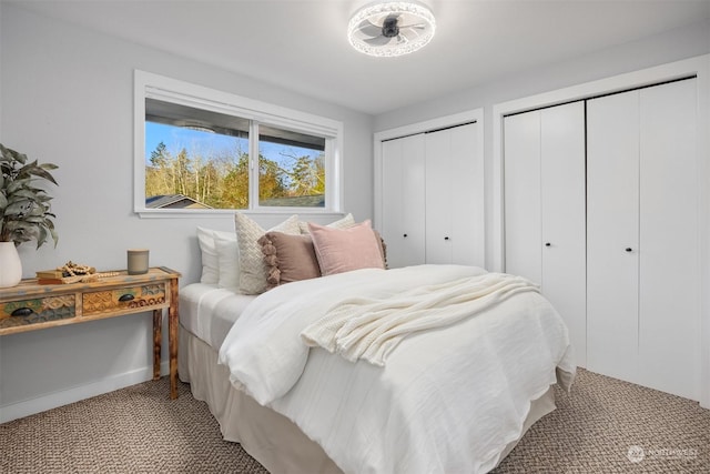 bedroom featuring two closets