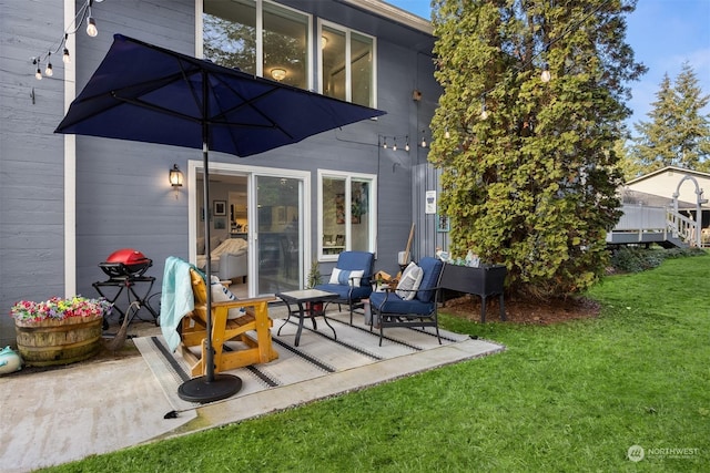 rear view of house featuring a patio and a yard