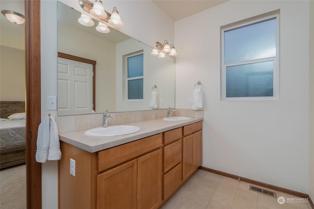 bathroom featuring vanity and tile patterned floors