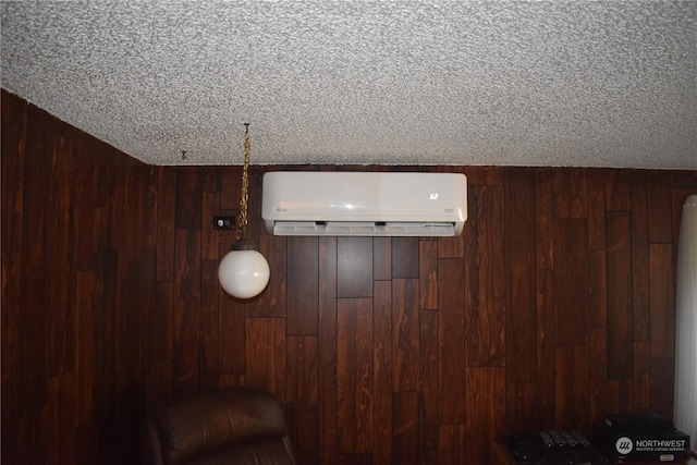 details with a wall mounted air conditioner and wood walls