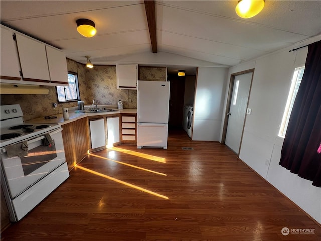 kitchen with sink, white appliances, dark wood-type flooring, lofted ceiling with beams, and washer / clothes dryer